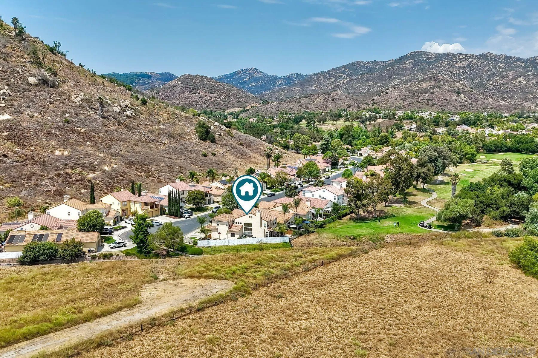 2476 Fallbrook Place Escondido, CA 92027 - Photo 29 of 33 a view of a town with mountains in the background