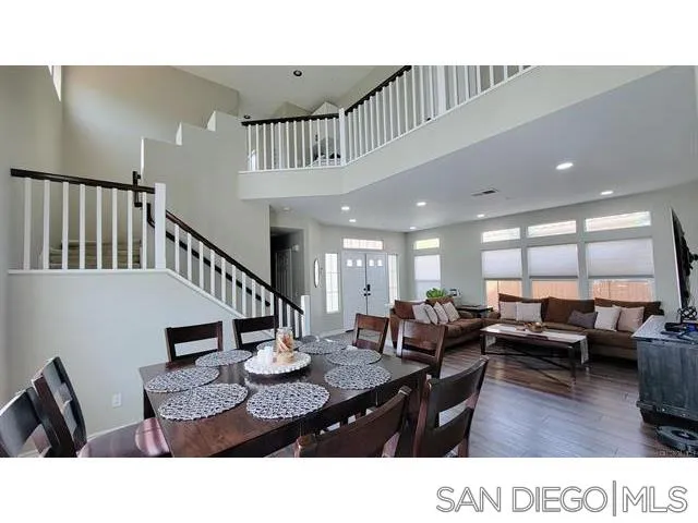 2476 Fallbrook Place Escondido, CA 92027 - Photo 8 of 33 a living room with lots of furniture and a wooden floor
