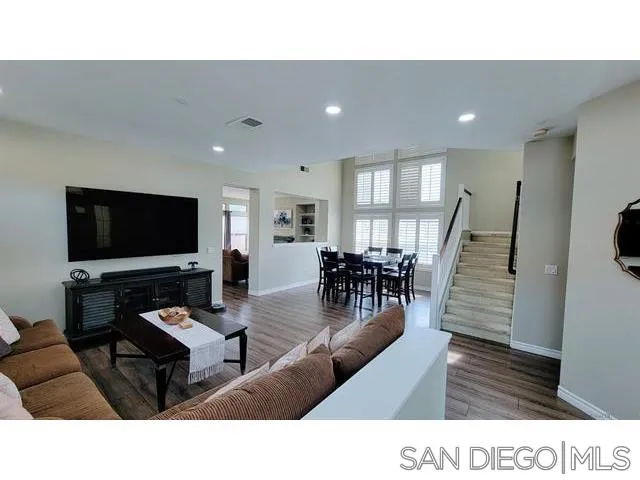 2476 Fallbrook Place Escondido, CA 92027 - Photo 10 of 33 a living room with furniture and a flat screen tv