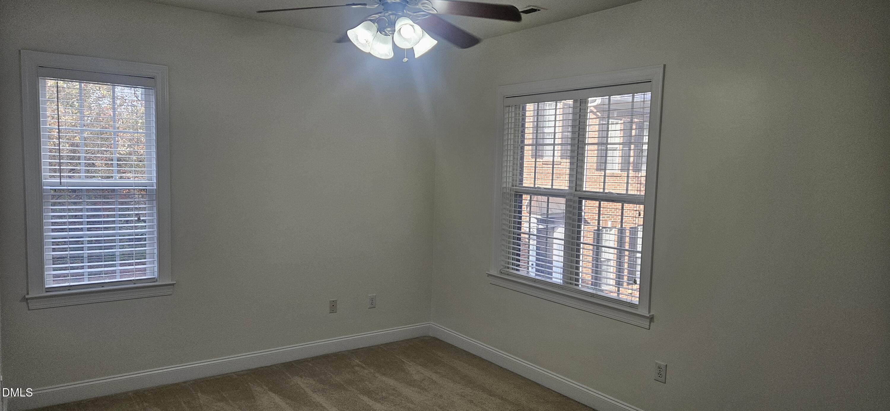 138 West Savannah Ridge Road Holly Springs, NC 27540 - Photo 15 of 22 an empty room with a window