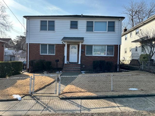 a front view of house with yard