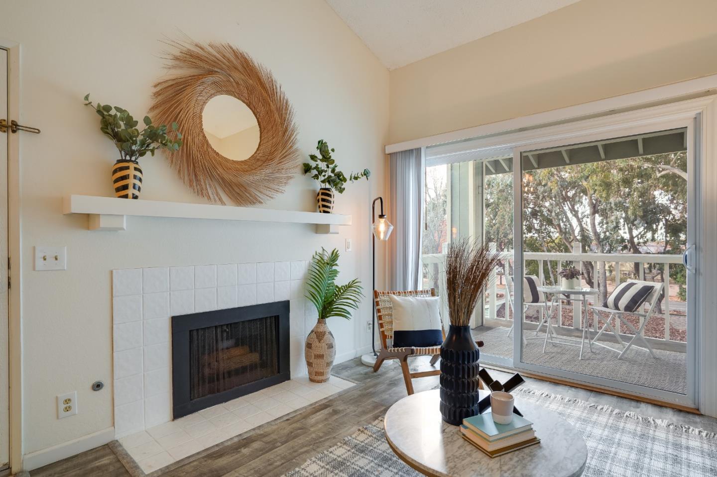 37050 Meadowbrook Common, Unit 302 Fremont, CA 94536 - Photo 5 of 21 a living room with furniture and a fireplace