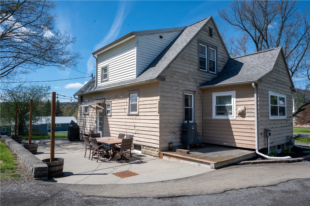 3365 Trapping Brook Road Wellsville, NY 14895 - Photo 33 of 47 Great view of the patio and to the right, the hot tub deck. There is updated service ready!