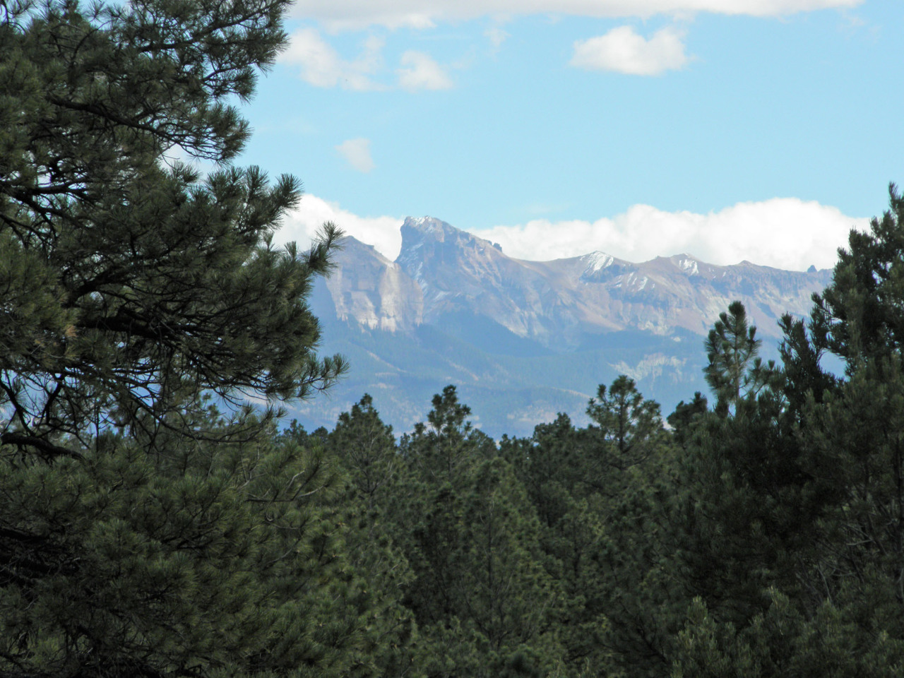 Tbd Big Canyon Point Ridgway, CO 81432 - Photo 11 of 14 a view of a house with a mountain in the background