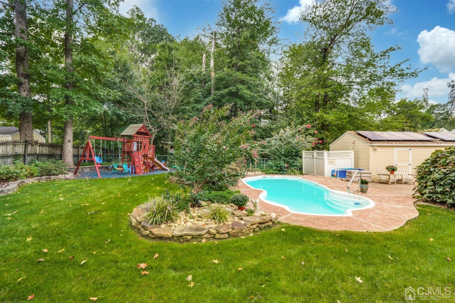 217 Oxford Road Edison, NJ 08820 - Photo 25 of 27 a view of a house with a backyard porch and sitting area