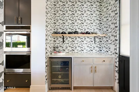 a living room with furniture and white walls