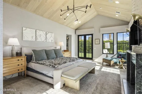 a view of a house with a yard and plants