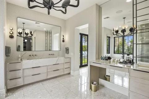 a view of a house with backyard porch and sitting area