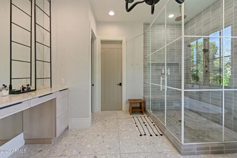 a view of a chairs and table in the patio