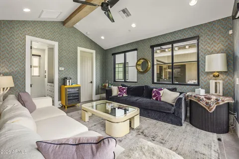 an aerial view of a house with a yard