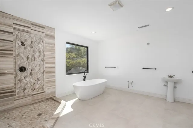 a view of entryway with wooden floor and a hallway