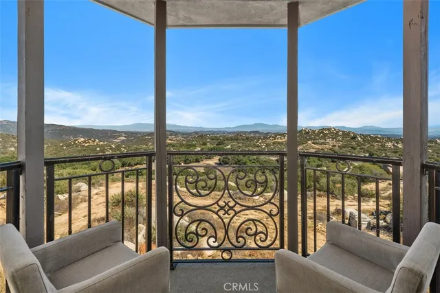 a view of entryway with stairs and wooden floor