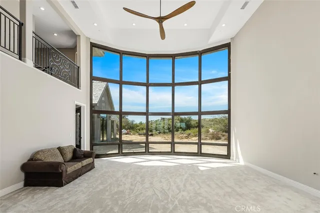 a view of kitchen island a sink a table and chairs