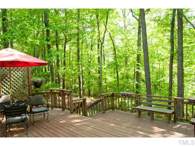 12129 Warwickshire Way Raleigh, NC 27613 - Photo 20 of 24 *Tempting Tiered Deck will Encourage You Outside to Enjoy the Seasons*Perfect for Parties*Property Backs to Natural Area w/ Walking Trails*