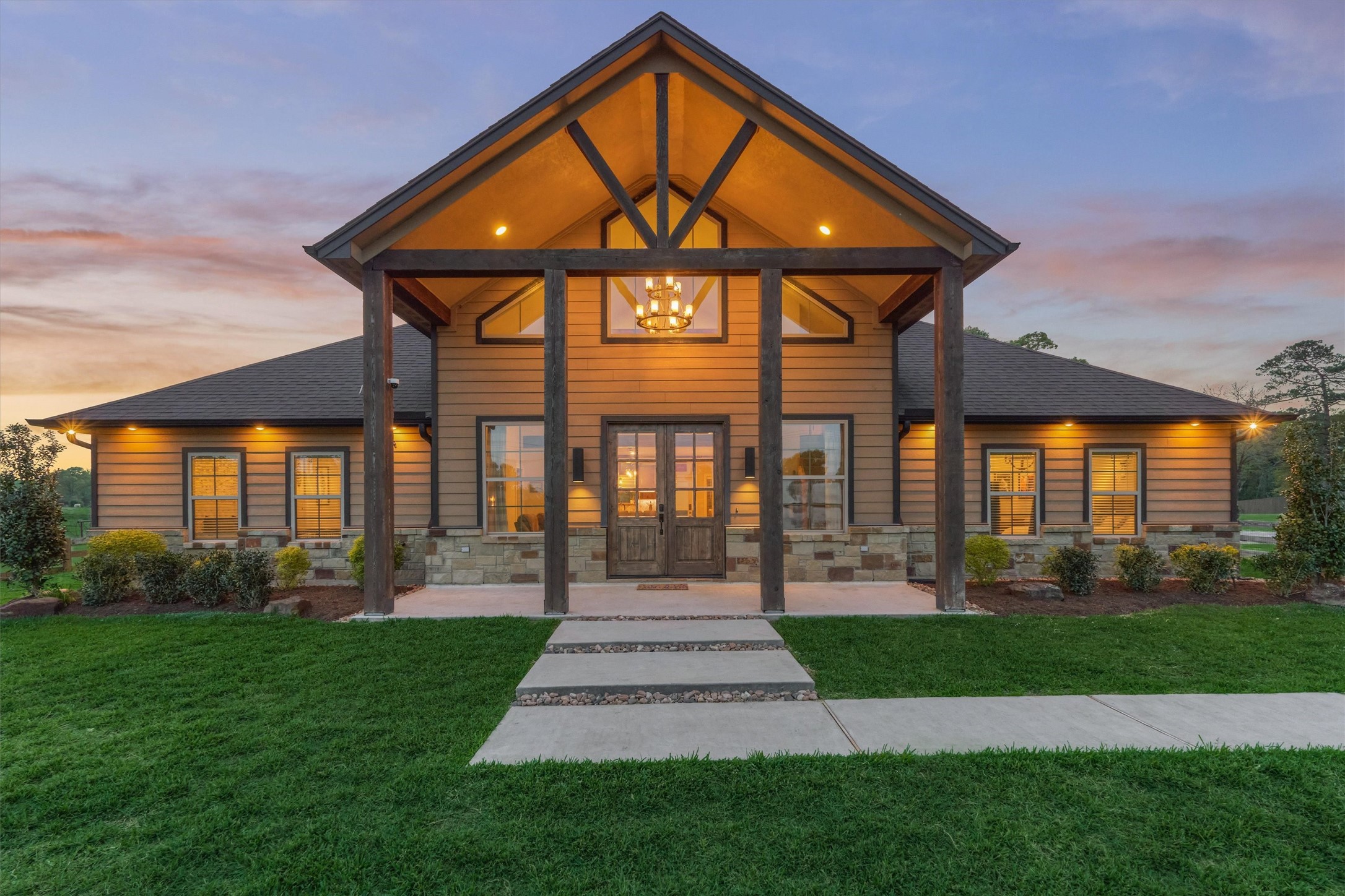 13125 Browder Traylor Road Willis, TX 77378 - Photo 11 of 50 a front view of a house with garden