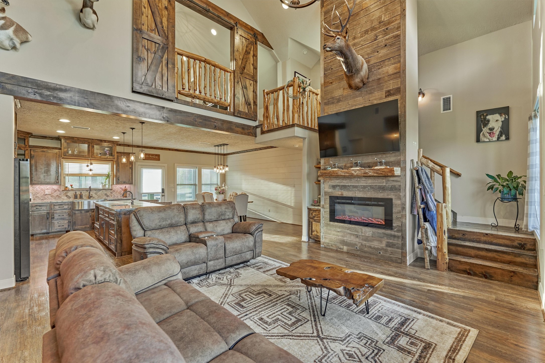 13125 Browder Traylor Road Willis, TX 77378 - Photo 16 of 50 a living room with fireplace furniture and a rug