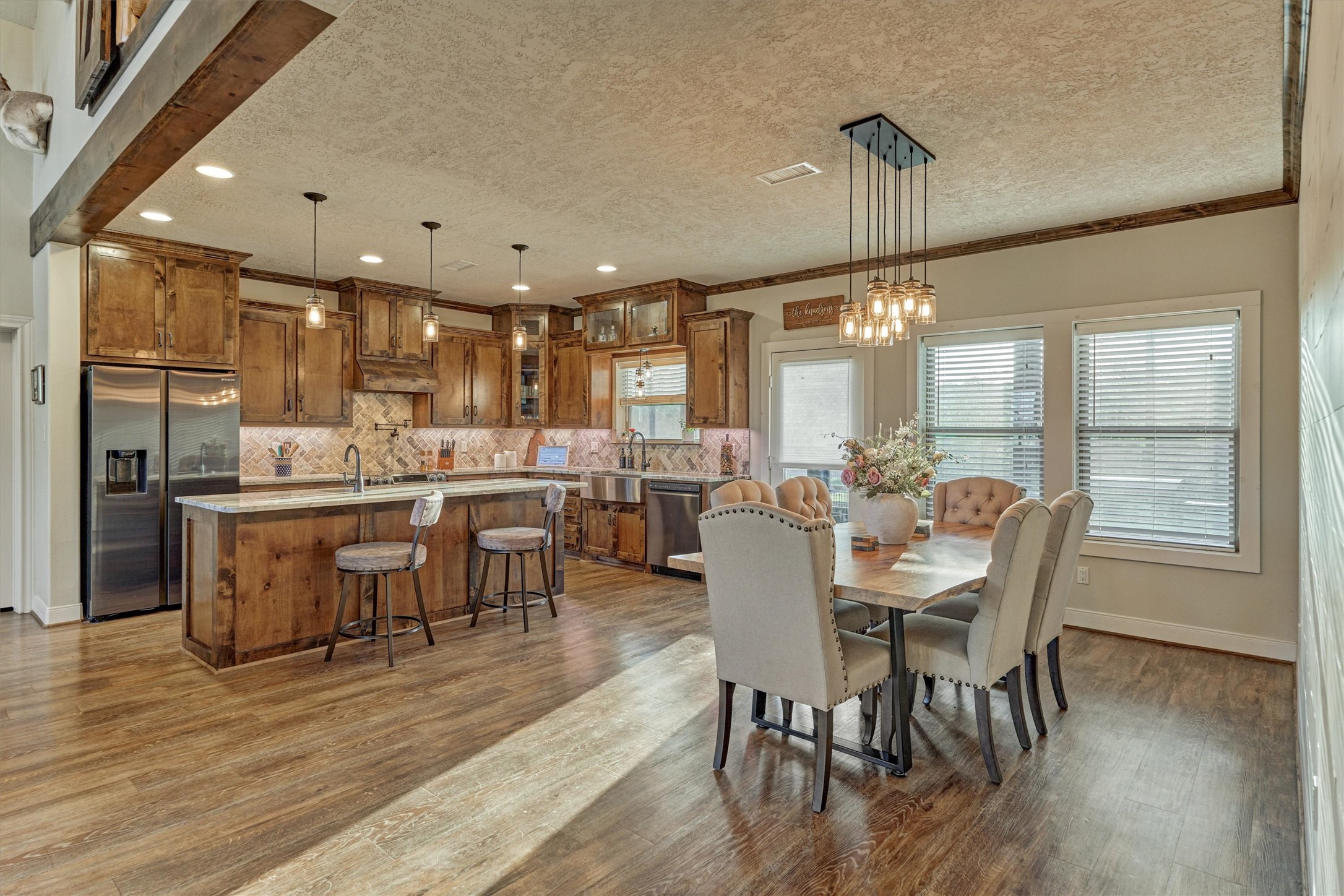 13125 Browder Traylor Road Willis, TX 77378 - Photo 17 of 50 a view of a dining room with furniture window and wooden floor