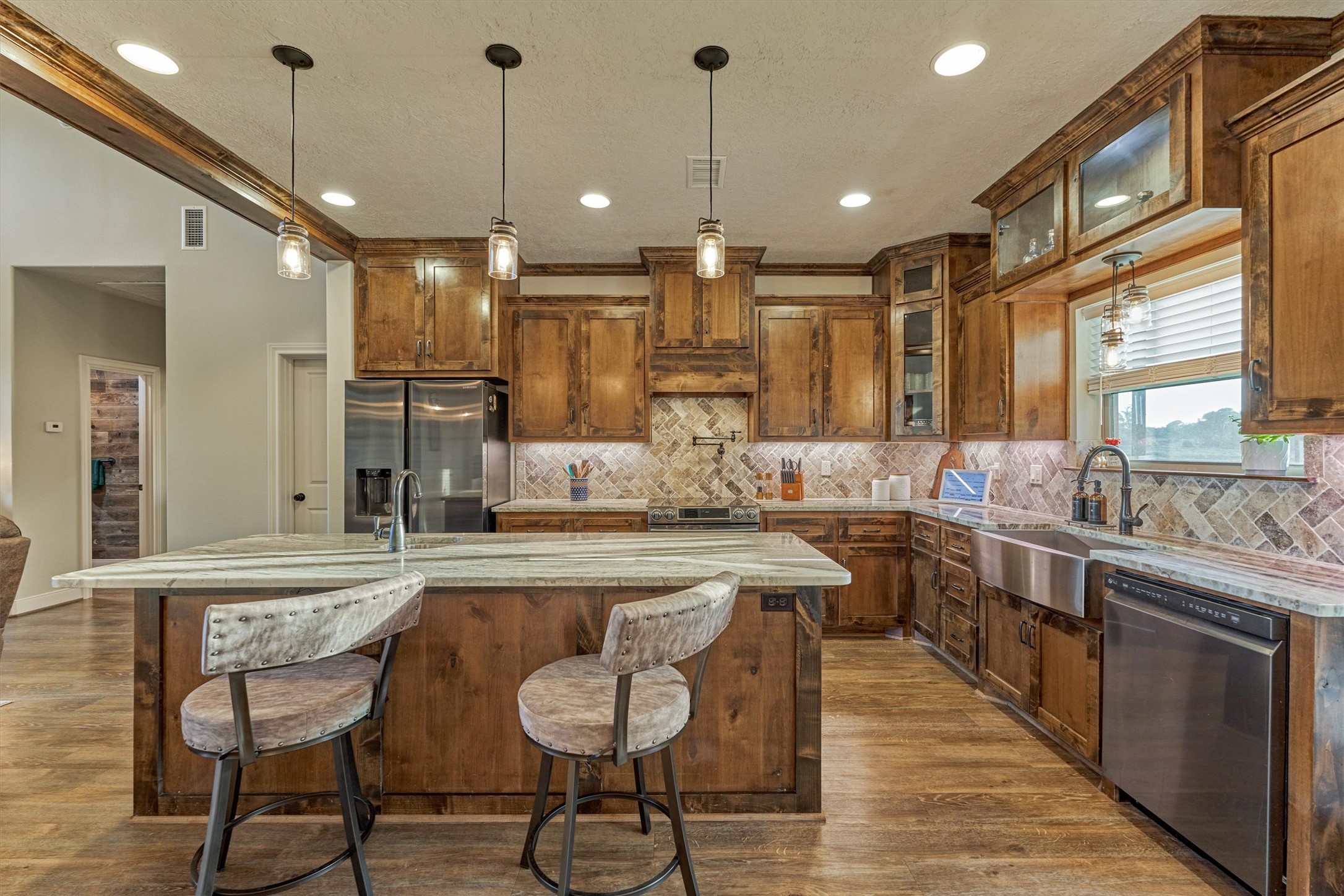 13125 Browder Traylor Road Willis, TX 77378 - Photo 19 of 50 a large kitchen with lots of counter space and a sink