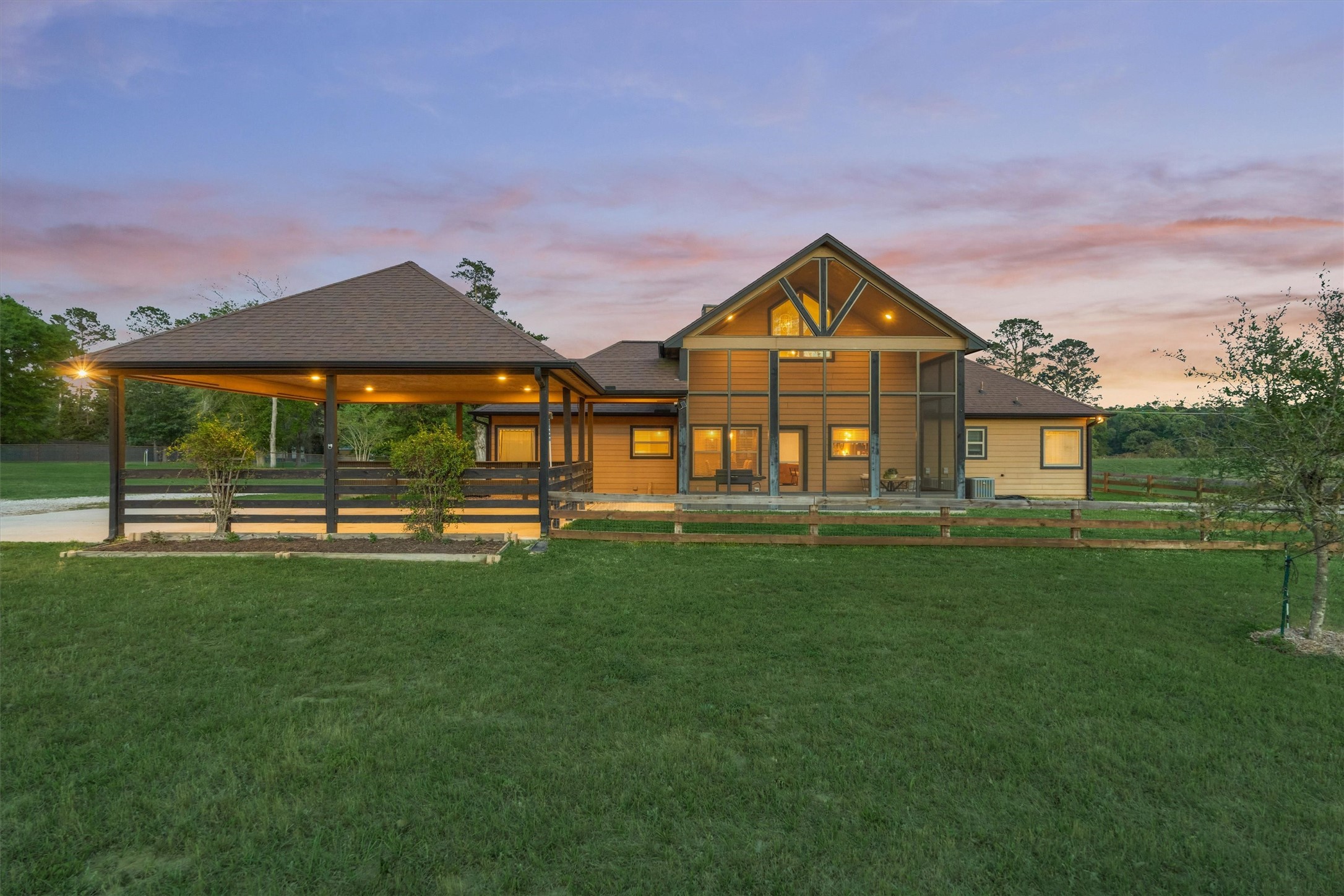 13125 Browder Traylor Road Willis, TX 77378 - Photo 2 of 50 a view of a big house with a big yard and potted plants