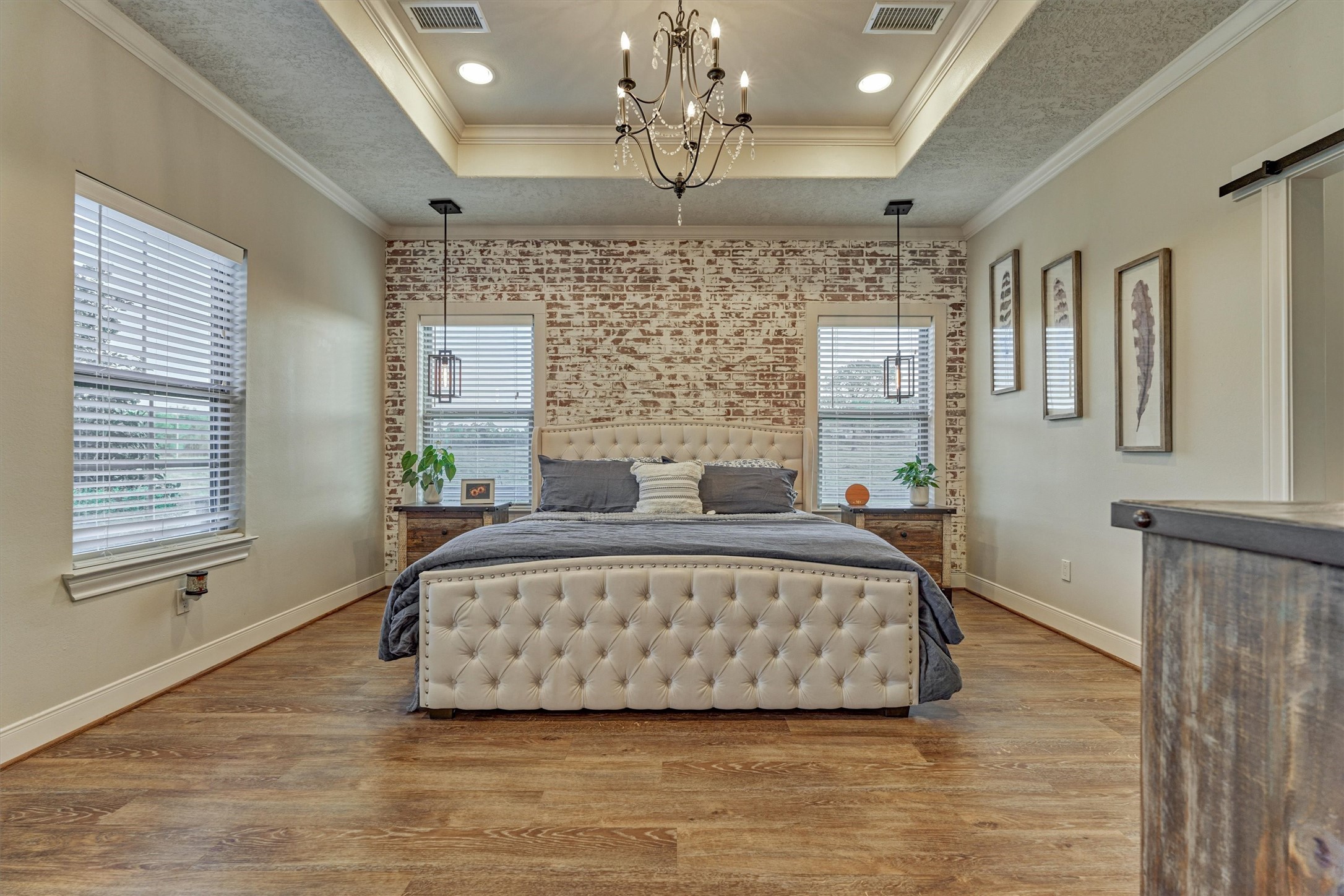 13125 Browder Traylor Road Willis, TX 77378 - Photo 23 of 50 a spacious bedroom with a bed mirror and window