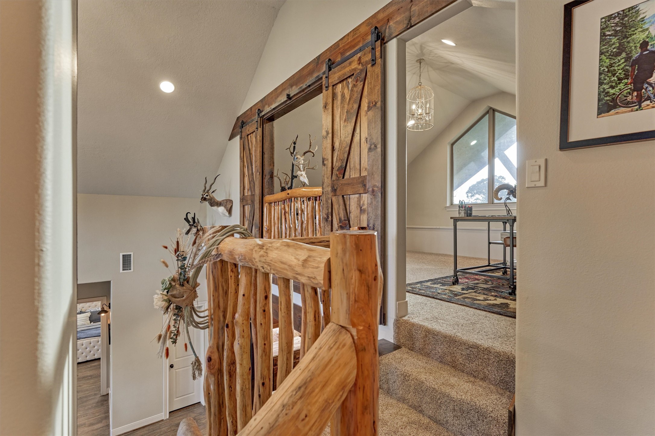 13125 Browder Traylor Road Willis, TX 77378 - Photo 33 of 50 a view of a hallway with wooden floor and staircase