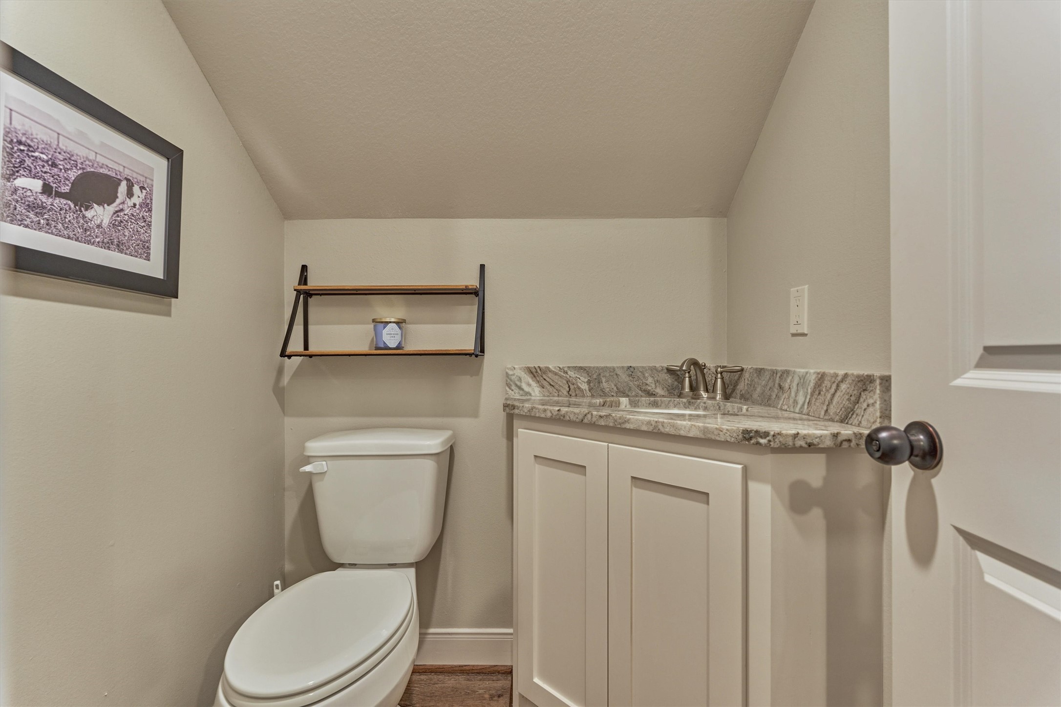 13125 Browder Traylor Road Willis, TX 77378 - Photo 35 of 50 a bathroom with a granite countertop toilet sink and mirror