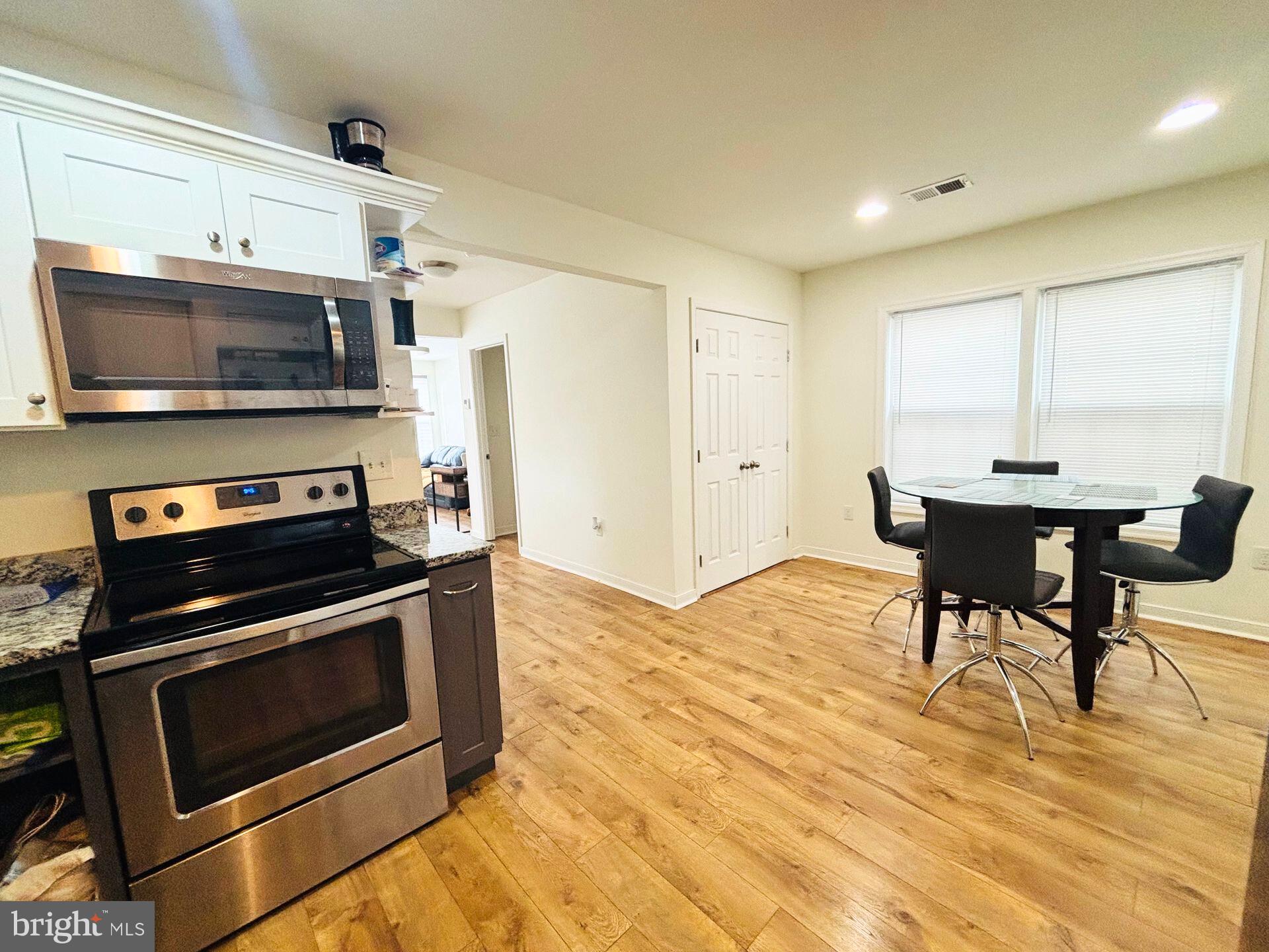 273 4th Avenue, Unit 101 Quantico, VA 22134 - Photo 14 of 36 a kitchen with a stove and a microwave