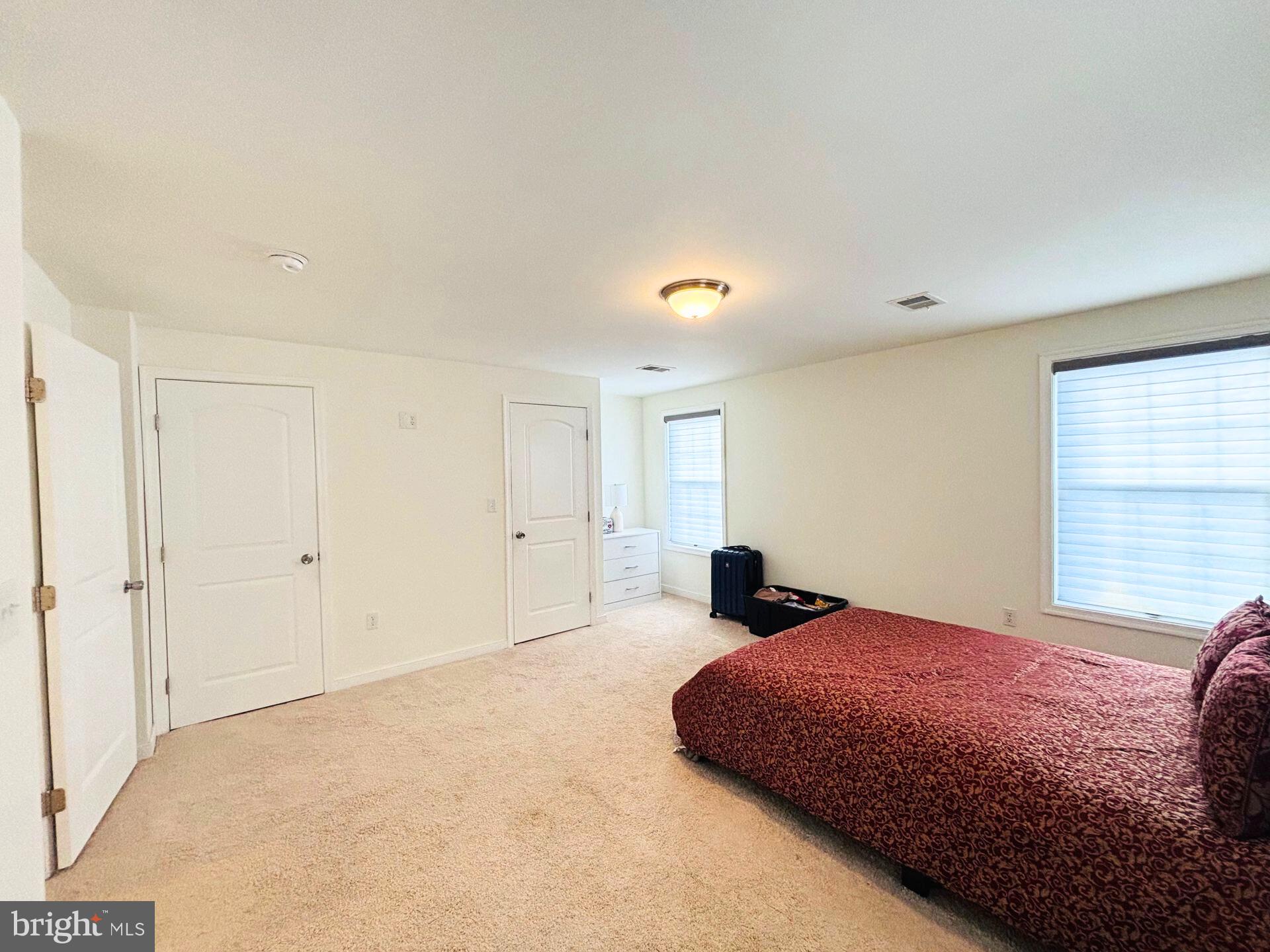 273 4th Avenue, Unit 101 Quantico, VA 22134 - Photo 25 of 36 a bedroom with a bed and a window