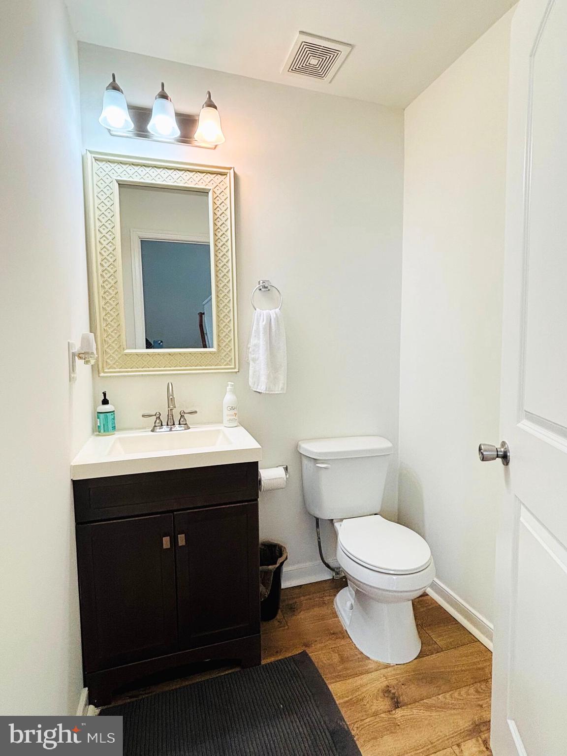 273 4th Avenue, Unit 101 Quantico, VA 22134 - Photo 10 of 36 a bathroom with a sink and a mirror