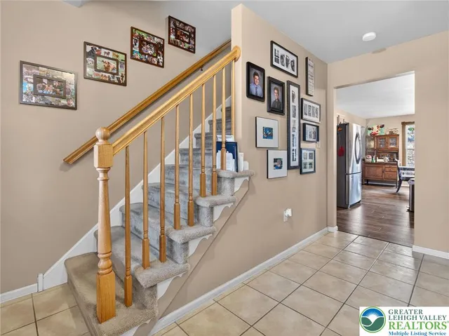 a view of a hallway with a stairs