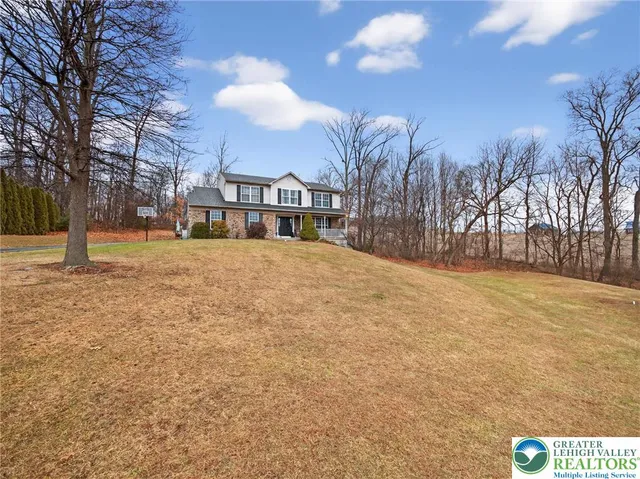 a view of a house with a patio