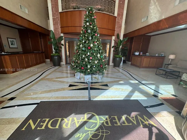 a kitchen with a table and chairs in it