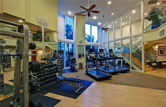 a view of a dining room with furniture and a window