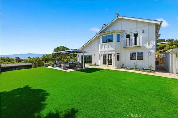 a view of house with garden