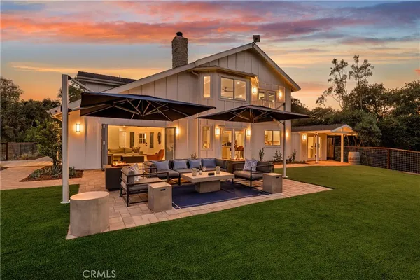 a view of a house with patio
