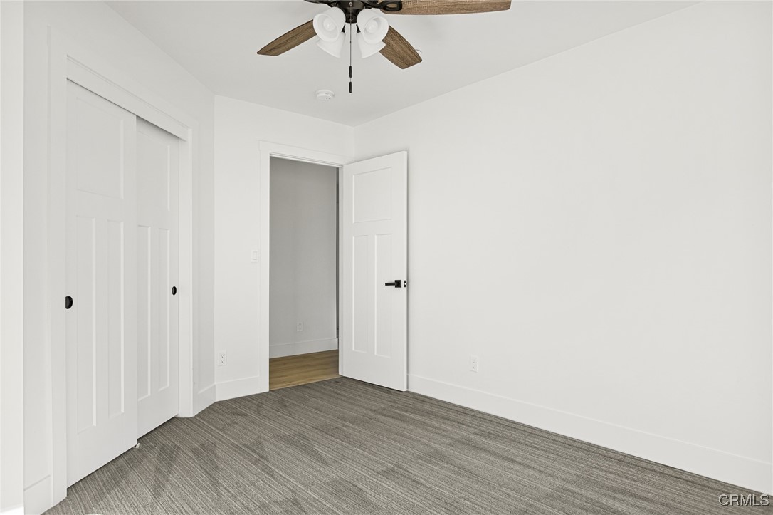 26880 Abner Drive Lake Arrowhead, CA 92352 - Photo 23 of 36 a view of an empty room with a chandelier