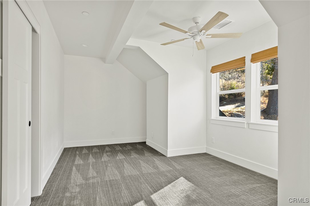26880 Abner Drive Lake Arrowhead, CA 92352 - Photo 25 of 36 an empty room with wooden floor closet and windows