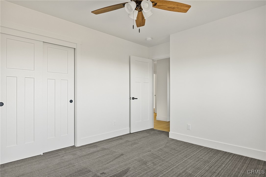 26880 Abner Drive Lake Arrowhead, CA 92352 - Photo 28 of 36 a view of an empty room with wooden floor