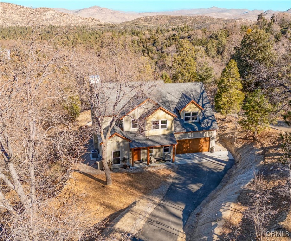 26880 Abner Drive Lake Arrowhead, CA 92352 - Photo 34 of 36 an aerial view of a house with a yard