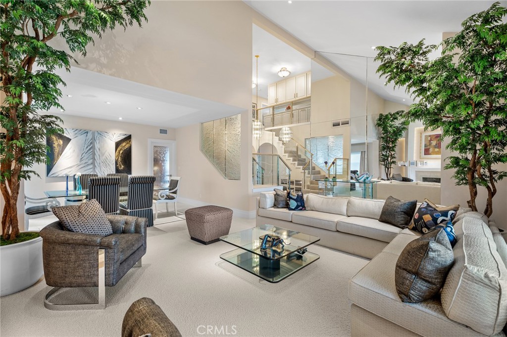 18927 Granada Circle Porter Ranch, CA 91326 - Photo 12 of 75 a living room with furniture and a potted plant