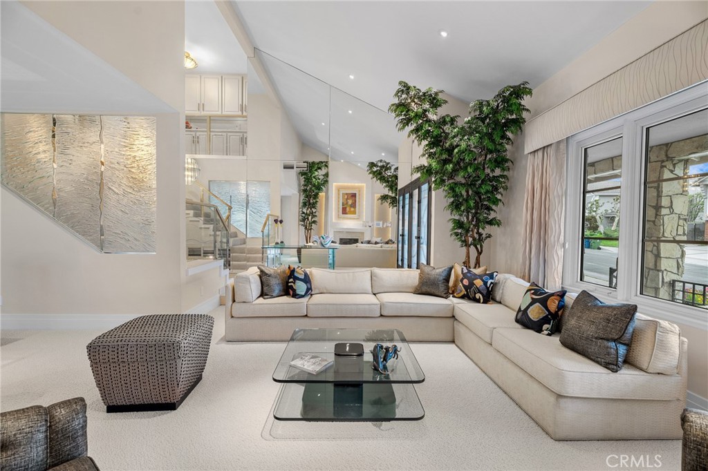 18927 Granada Circle Porter Ranch, CA 91326 - Photo 13 of 75 a living room with furniture and a large window