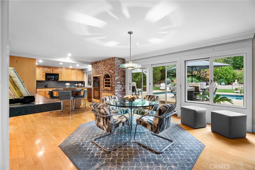 18927 Granada Circle Porter Ranch, CA 91326 - Photo 21 of 75 a living room with fireplace furniture and a large window