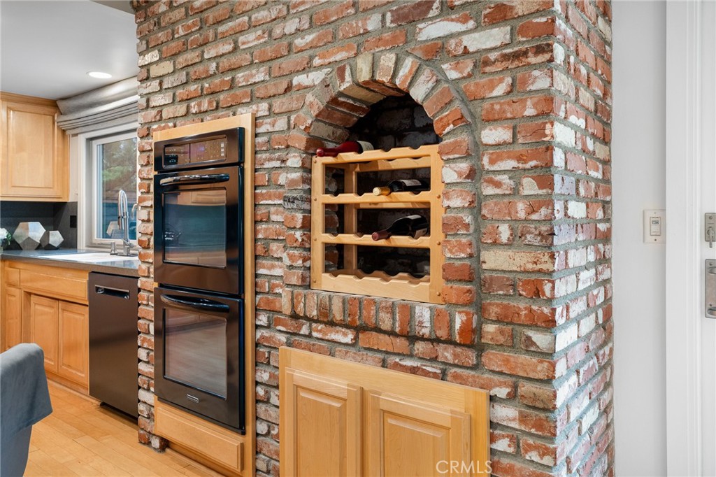 18927 Granada Circle Porter Ranch, CA 91326 - Photo 26 of 75 a kitchen with a sink and cabinets