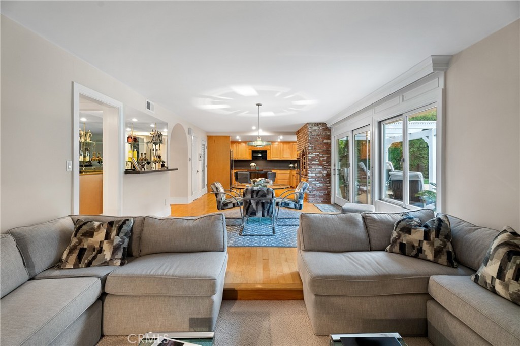 18927 Granada Circle Porter Ranch, CA 91326 - Photo 32 of 75 a living room with furniture and a large window