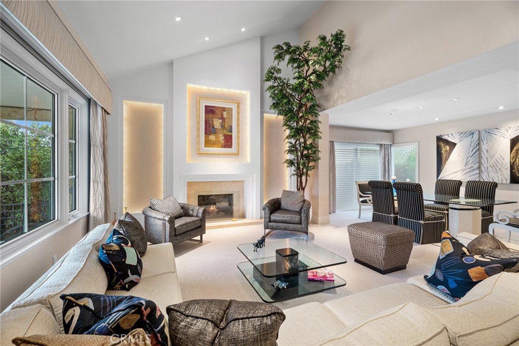 18927 Granada Circle Porter Ranch, CA 91326 - Photo 4 of 75 a living room with furniture potted plant and a large window