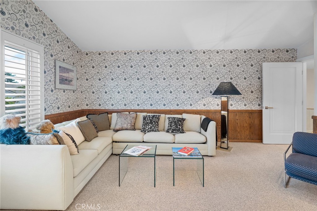 18927 Granada Circle Porter Ranch, CA 91326 - Photo 54 of 75 a living room with furniture and a large window