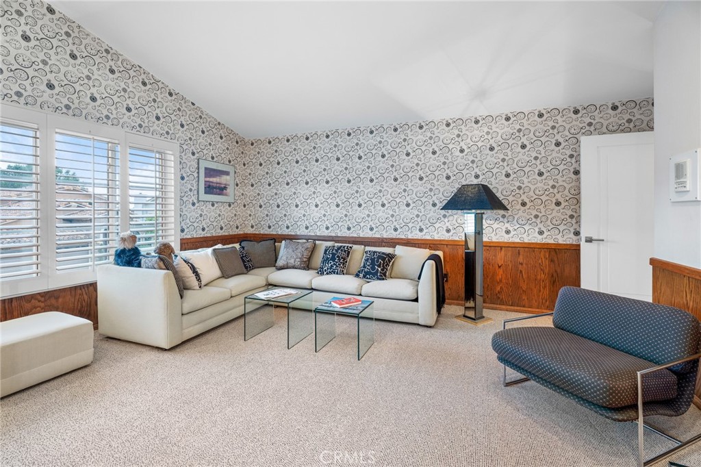 18927 Granada Circle Porter Ranch, CA 91326 - Photo 55 of 75 a living room with furniture and a large window