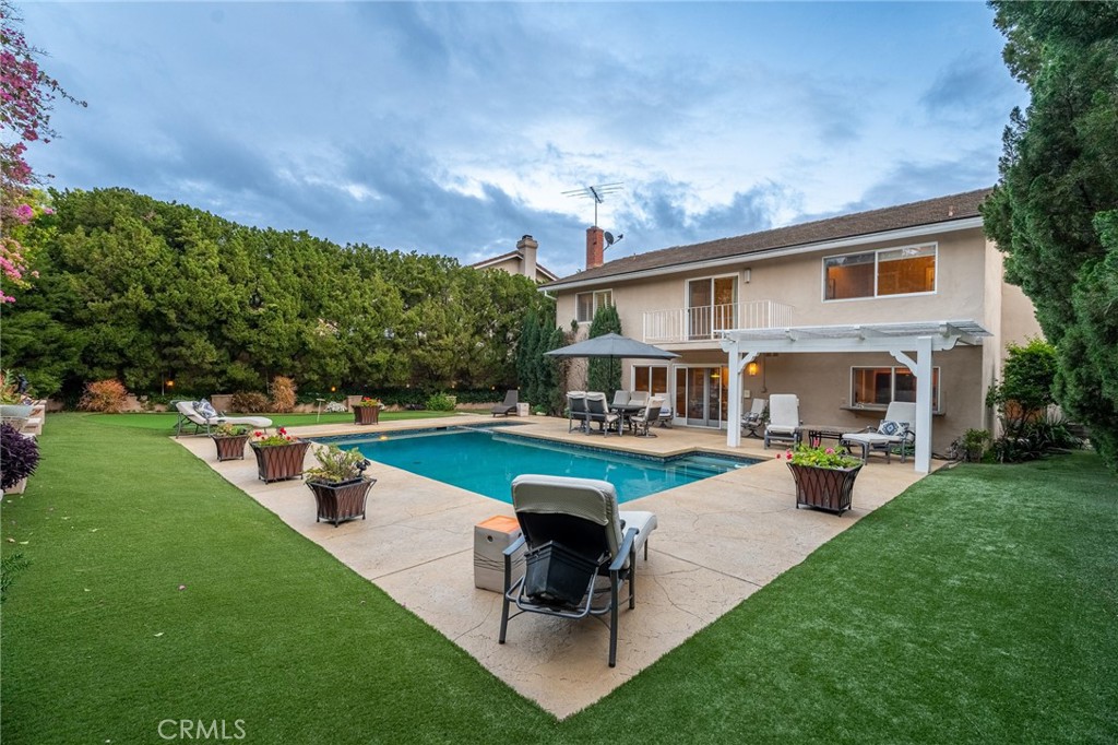 18927 Granada Circle Porter Ranch, CA 91326 - Photo 68 of 75 a view of a house with swimming pool and sitting area