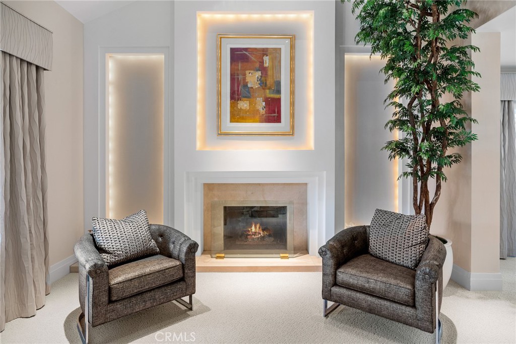 18927 Granada Circle Porter Ranch, CA 91326 - Photo 7 of 75 a living room with furniture and a potted plant