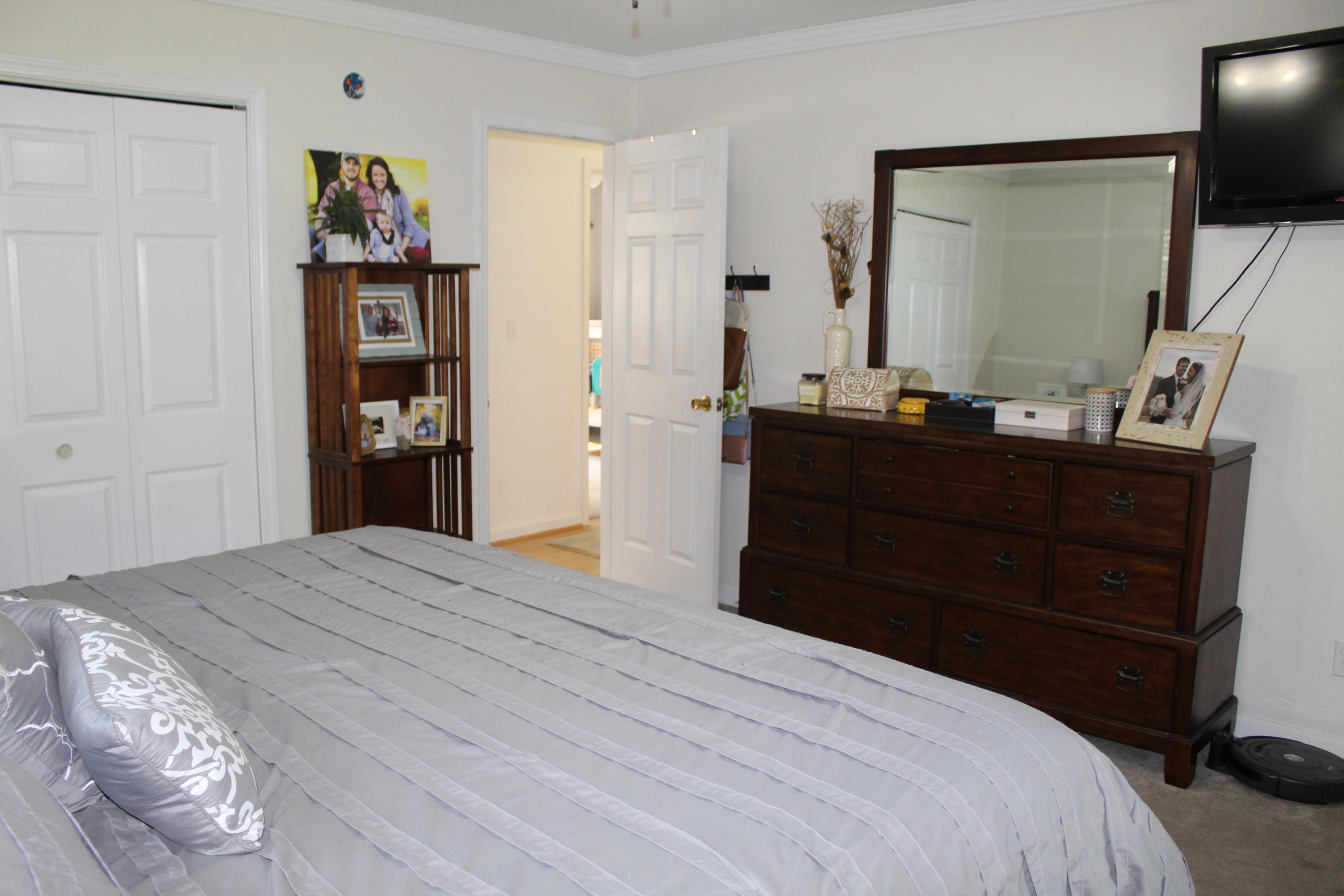554 Fields Avenue Blue Ridge, VA 24064 - Photo 50 of 73 a bedroom with a bed and a flat screen tv